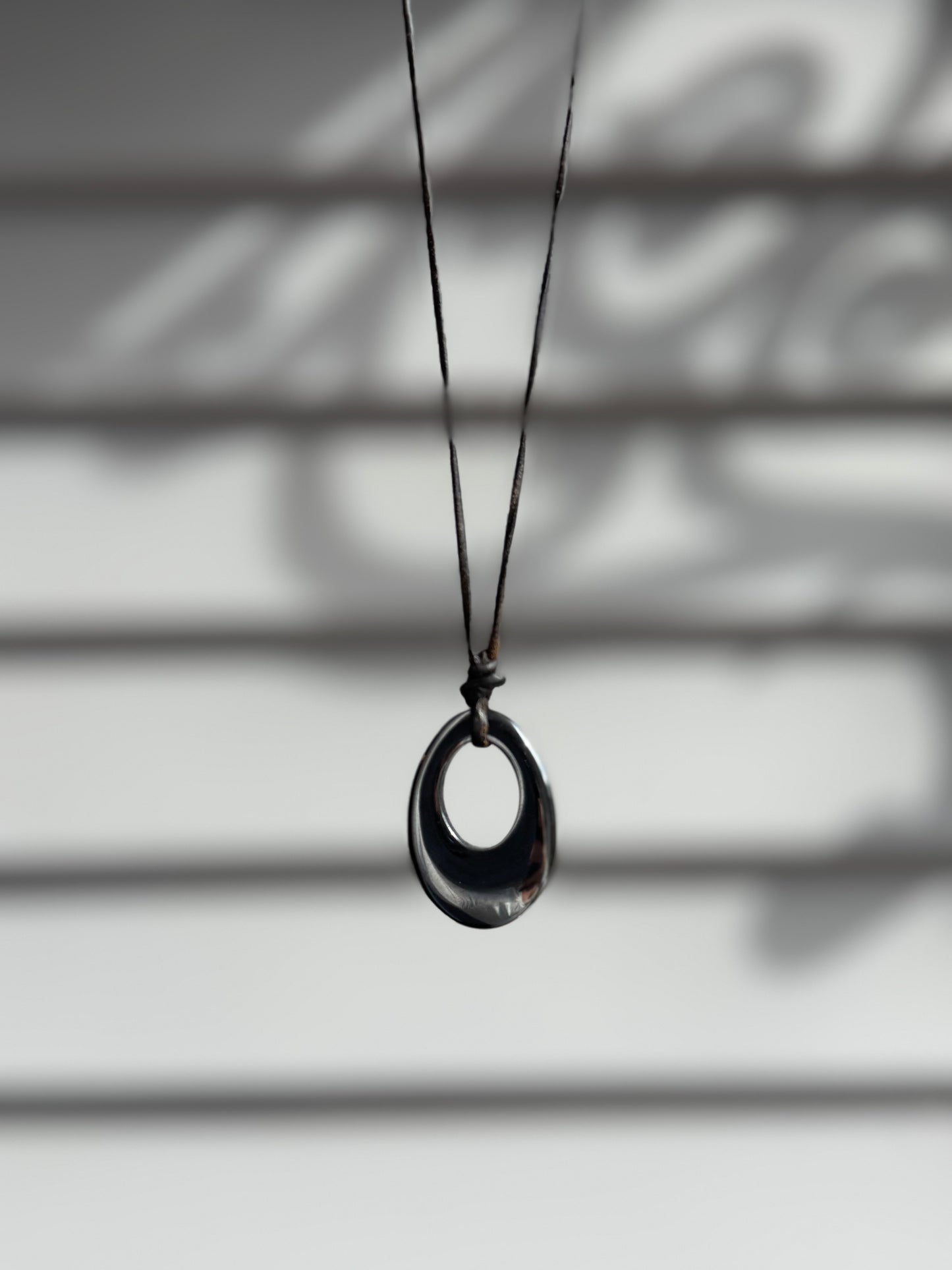 Black Oval Pendant Necklace